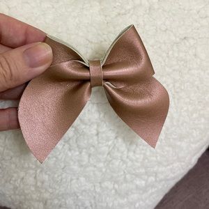 Hand cut and made leather bow hair clip